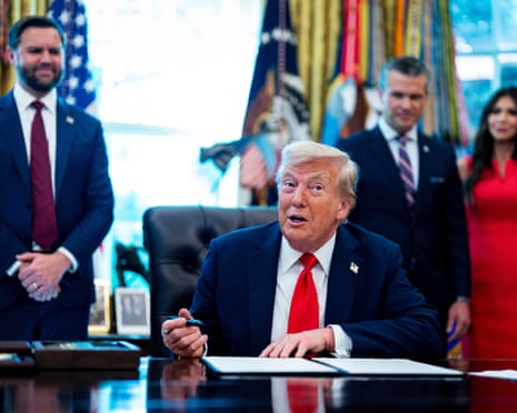 US President Donald Trump during an executive order signing in the Oval Office of the White House in Washington DC, USA.