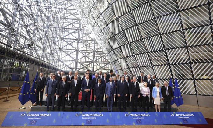 European Union heads of state and western Balkan leaders pose for a group photo during an EU summit in Brussels.