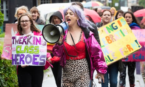 Strip club dancers march through Sheffield to oppose moves to close a branch of Spearmint Rhino.