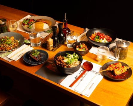 Number of dishes laid out on a table at Wagamama