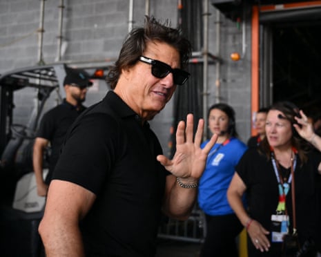 Tom Cruise walks into the stadium in New Jersey.