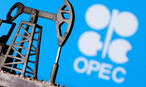A 3D-printed oil pump jack in front of the OPEC logo