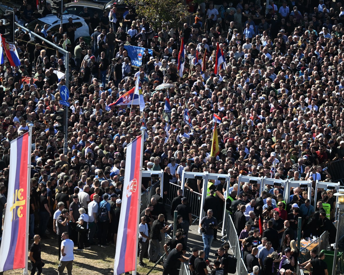 Mourners queue as they arrive to take part in a public memorial on the day of the funeral ceremony for late Bosnian Serb military leader Ratko Mladić at St Lukas church in Belgrade.
