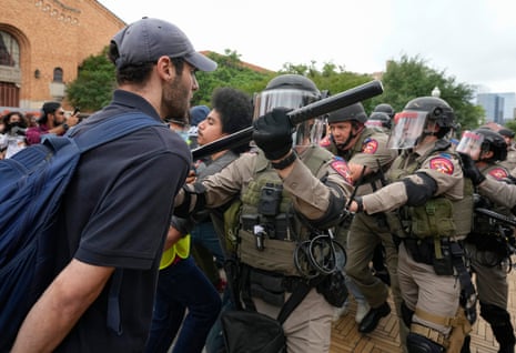 Texas state troopers in riot gear try to break up a pro-Palestinian protest.