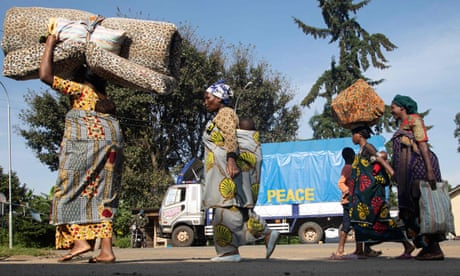 Refugees reach the Bunagana border point on their flight from conflict in DRC to safety in Uganda.