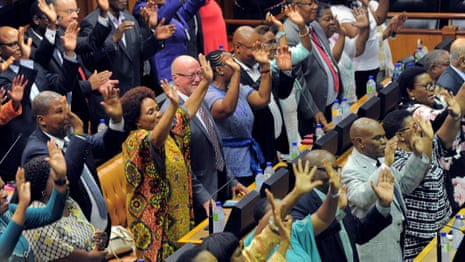 South African MPs celebrate as Cyril Ramaphosa is sworn in - video