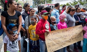 Hospital patients and relatives protest over scarcity of medical supplies in Caracas.