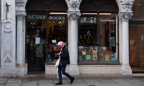 A pedestrian walks past the Middle Eastern specialist bookshop, Al Saqi Books, in Bayswater, west London, on December 14, 2022. 
