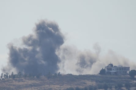 Smoke rises above the village of Kfar Tebnit in Nabatieh