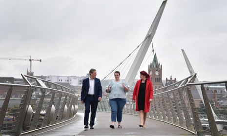 Keir Starmer in Derry speaking to Sara Canning, the partner of the murdered journalist Lyra McKee, and the shadow Northern Ireland secretary of state, Louise Haigh.