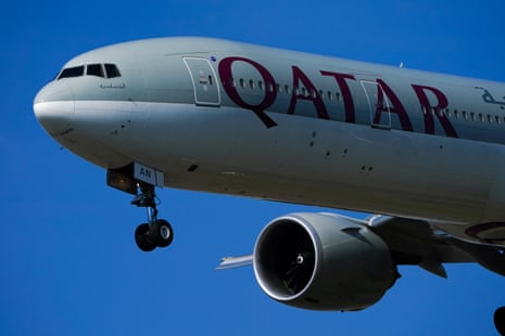 A Qatar Airways 777 jumbo plane landing