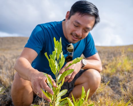 Yishan Wong the founder of Terraformation planting a tree