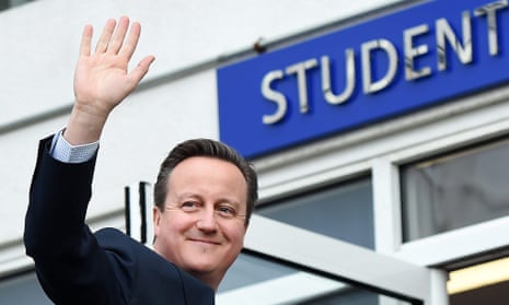 David Cameron waves to school children at the Harris academy school in London this week.