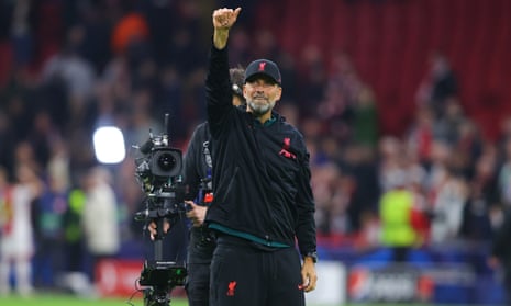 Jürgen Klopp salutes the Liverpool supporters in Amsterdam