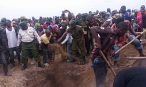 Photo of the burial of Kasereka Matendere Mwana Zaire. A ranger for Virunga National Park who drowned after his boat capsized in Lake Edward. Two others were killed as well.