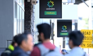 Peopler queue to enter Centrelink on 24 March 2020 in Melbourne, Australia. 