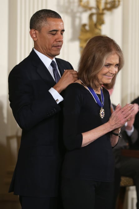 Gloria Steinem receiving the presidential medal of freedom award from Barack Obama in 2013