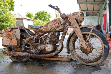 An extremely rusted over but still in tact military motorcycle