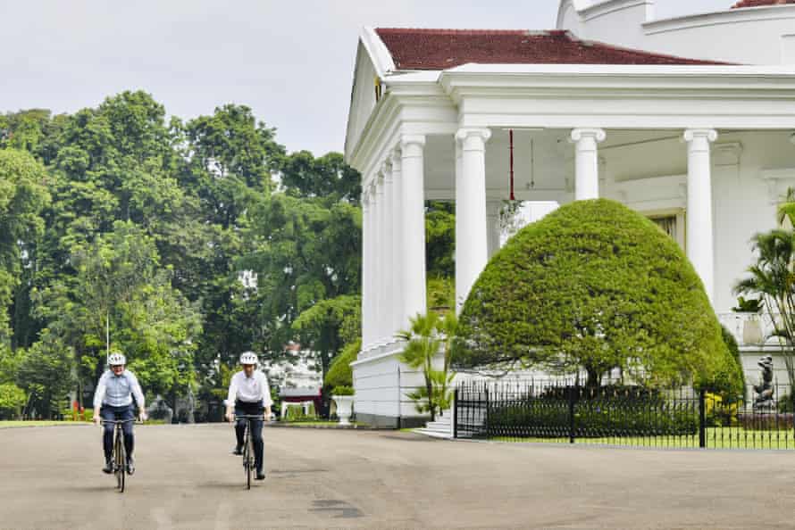 In this photo released by the Indonesian Presidential Palace, Indonesian President Joko Widodo, right, and Australian Prime Minister Anthony Albanese ride bicycles during their meeting at Bogor Palace in Bogor, Indonesia, Monday, June 6, 2022.