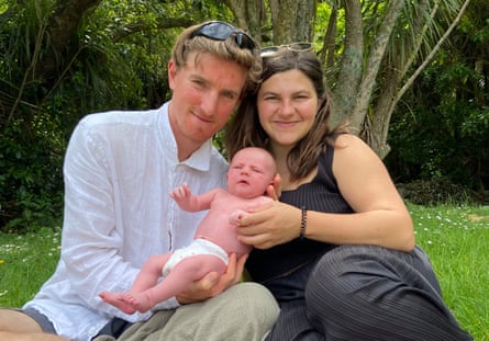 Levi Brinsdon-Hall and Ella Rose Shnapp with their newborn.