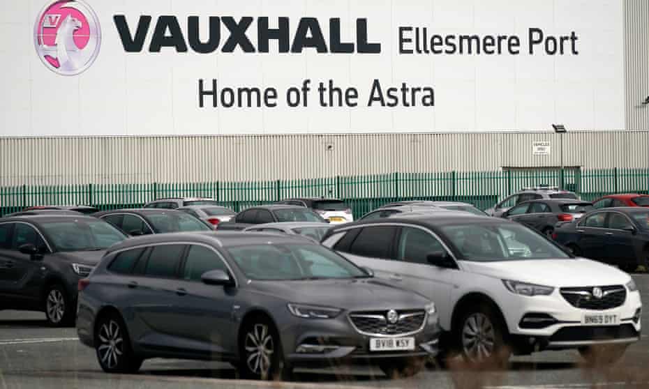 Cars are parked outside the Vauxhall car assembly plant on March 17, 2020 in Ellesmere Port, England