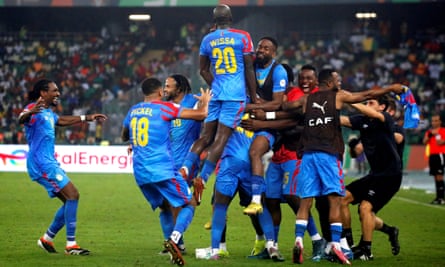 DR Congo players celebrate after Arthur Masuaku’s goal seals a quarter-final victory against Guinea