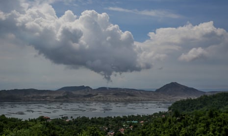 A plume of ash and steam rises from the Taal volcano in Batangas province, the Philippines