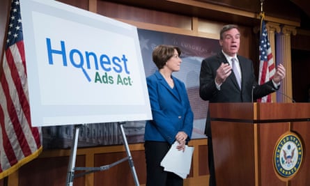 Senators Amy Klobuchar and Mark Warner introduce the Honest Ads Act at a news conference on Capitol Hill on 19 October 2017.