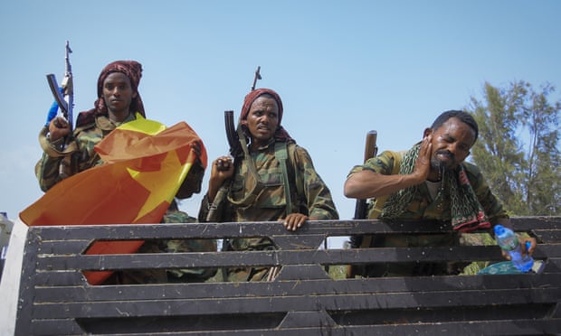 Tigrayan forces ride in a truck after taking control of Mekele, in the Tigray region of northern Ethiopia on Tuesday, June 2021