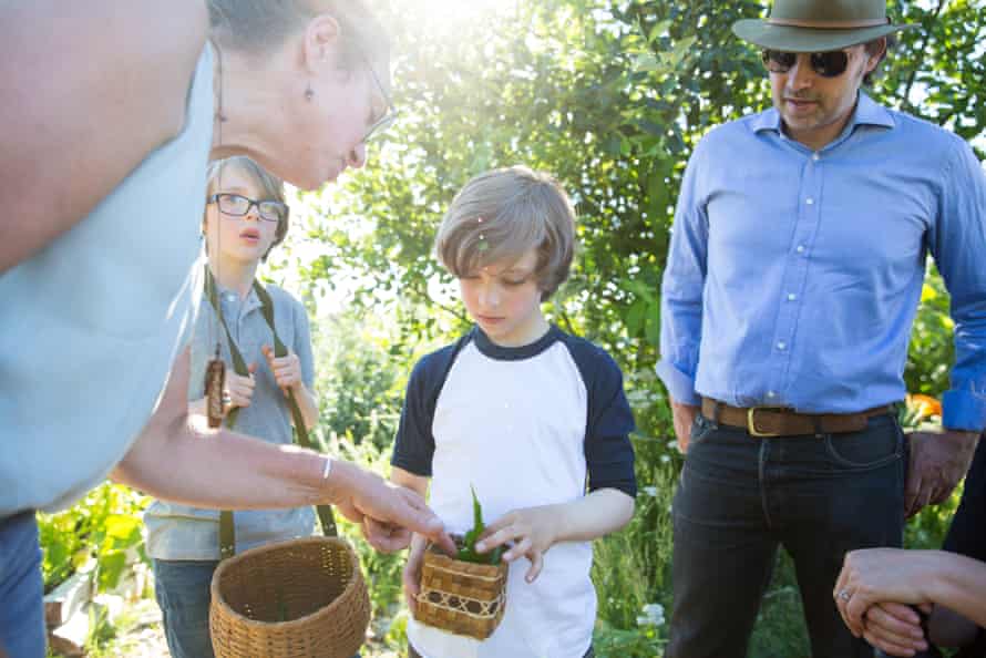 The Wolff family attend a foraging class with expert Karen Sherwood at Beacon Food Forest in Seattle.