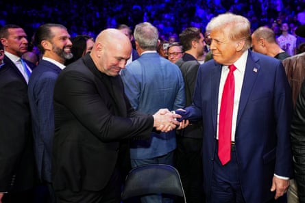 Dana White shakes hands with Trump at a UFC event in New York last year.
