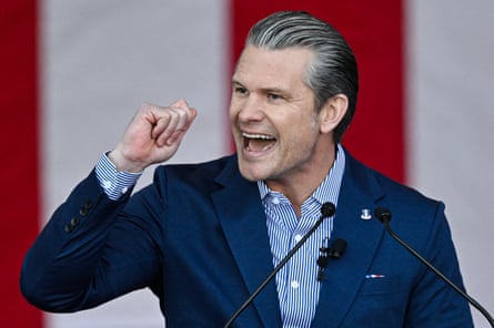 US defence secretary Pete Hegseth gestures while making a speech on stage.