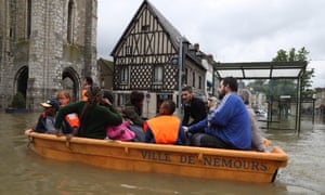 A rescue boat in a flooded street of Nemours, near Paris, France, after downpours in June 2016.