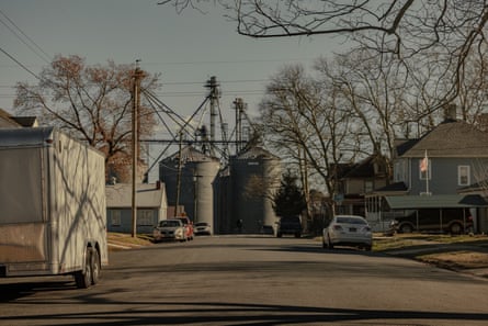 A Perdue AgriBusiness grain facility is seen in the distance in a neighborhood in Seaford, Delaware.