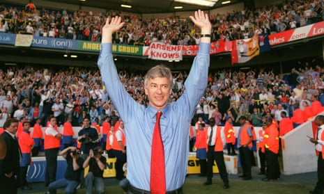 Wenger celebrates Arsenal winning the Premier League at White Hart Lane, London, in 2004.