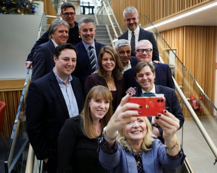 The deputy prime minister, Angela Rayner, the mayor of London, Sadiq Khan and the mayor of West Yorkshire, Tracy Brabin, pose for a selfie with regional mayors, in Leeds.