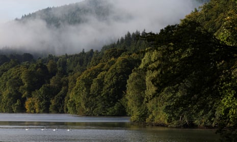 ‘Outside, mist gathers its wrapcloser’ … mist sits above Loch Faskally in Scotland.