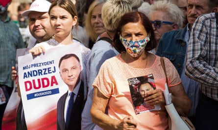 Supporters attend a rally addressed by Poland’s rightwing current president Andrzej Duda ahead of next Sunday’s poll.