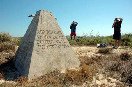 A concrete marker in the sand reads ‘A British atomic weapon was test exploded above this point in 1956’