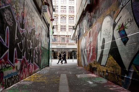 Locals walk by a deserted laneway in Melbourne. During coronavirus lockdown in Victoria, there have been around 2,347 people on waitlists for drug rehabilitation treatments.
