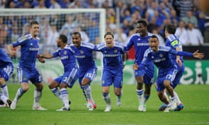 Chelsea react to Didier Drogba’s winning penalty.