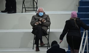 Former presidential candidate, Senator Bernie Sanders sits in the bleachers on Capitol Hill with his now famous mittens.