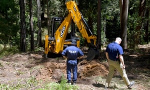 Police and forensic officers continue their search at the site where Matthew Leveson may be buried, in the Royal national park, near Waterfall south of Sydney on Sunday.