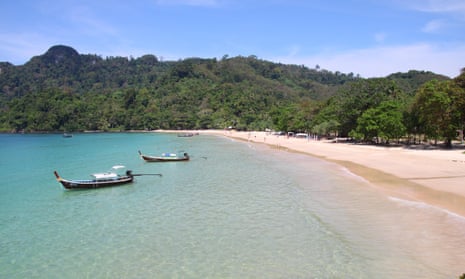 Tranquil Trang … the bay of Haad Farang, Koh Muk, with two longtail boats anchored just off the beach. Thailand.