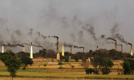 Smoke rises from brick kiln chimneys in Delhi.