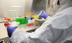 A researcher at work in a cell culture suite in the CSIRO National Vaccine and Therapeutics Laboratory in Melbourne