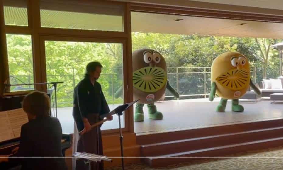 Dancing kiwis greet New Zealand prime minister Jacinda Ardern in Japan.