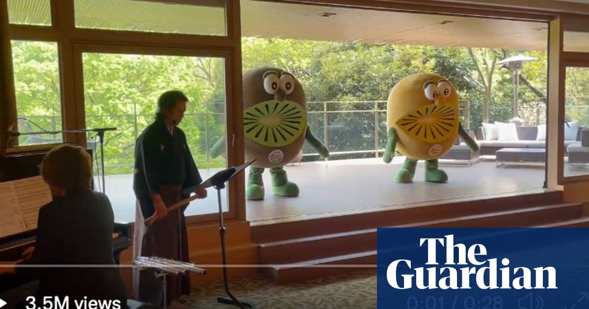 Jacinda Ardern greeted by giant sad dancing kiwifruit during visit to Japan