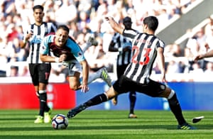 Newcastle United’s Mikel Merino upends West Ham United’s Javier Hernandez as the Magpies get their first win of the season, 3-0 at St James’ Park