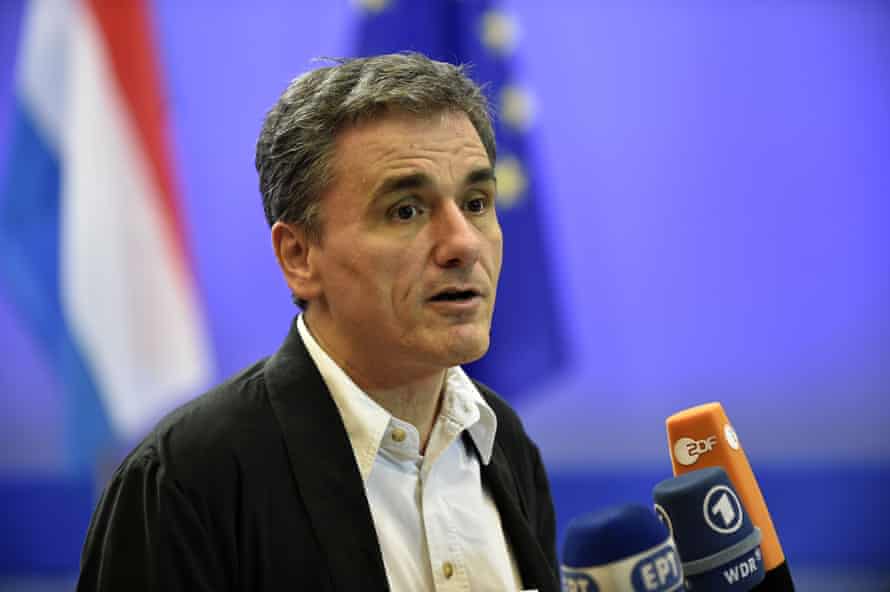 Greek Finance Minister Euclid Tsakalotos answers journalists after a meeting of the Eurogroup on Greece at the European Union headquarters in Brussels on August 14, 2015. Eurozone finance ministers approved Friday a third debt bailout worth up to 86 billion euros to keep Greece afloat and avoid its chaotic exit from the single currency bloc, officials said. AFP PHOTO/ JOHN THYSJOHN THYS/AFP/Getty Images